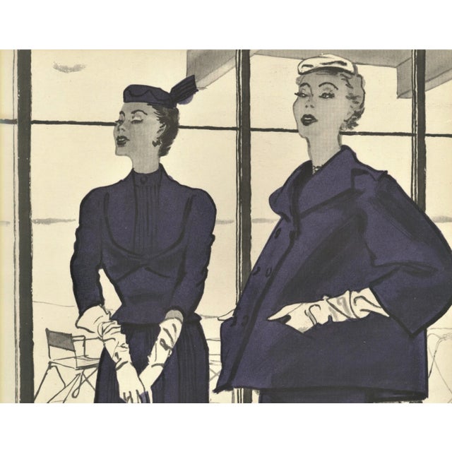 This is a mid-century French fashion print that showcases 2 designs by the iconic Christian Dior. It originally appeared...