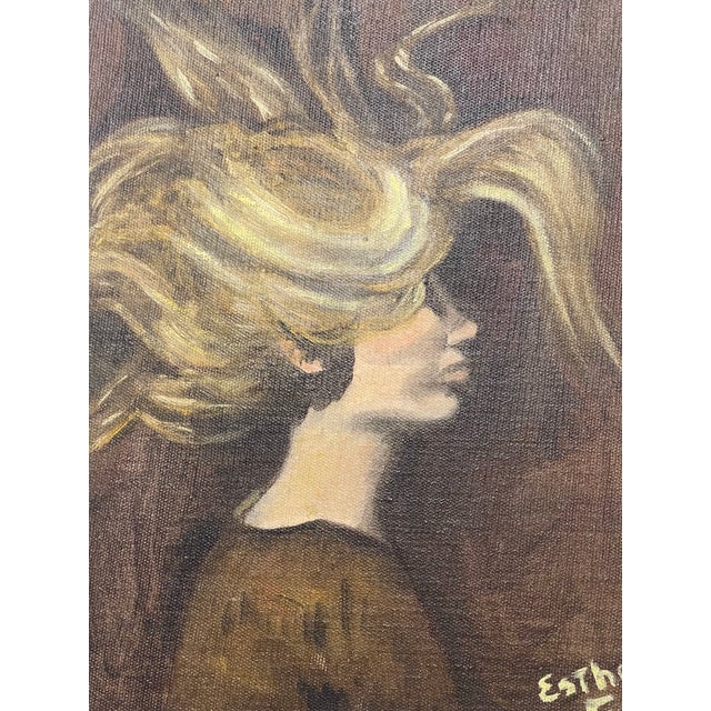 A wonderfully expressive vintage portrait depicting a woman in profile with dramatically windswept hair sweeping across...