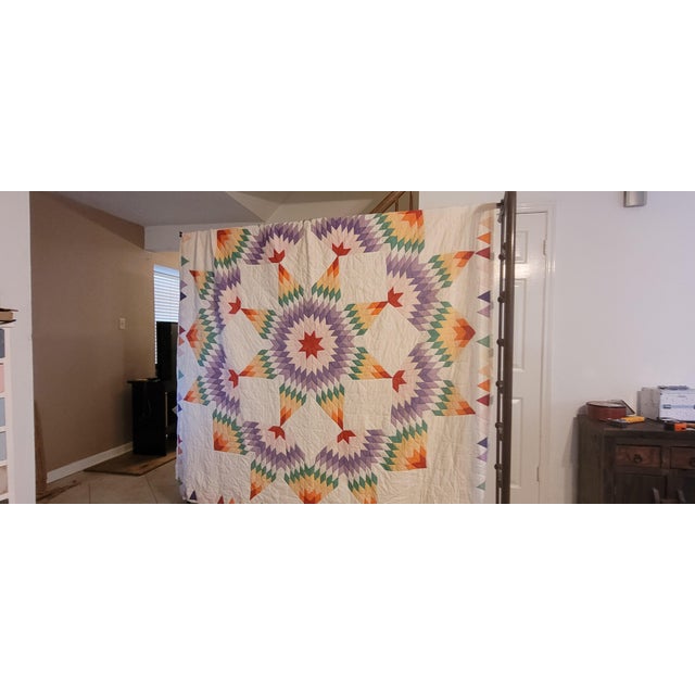 Antique king-size handmade quilt is gorgeous. the skill and craftsmanship are unmatched. this quilt is vibrant with color...