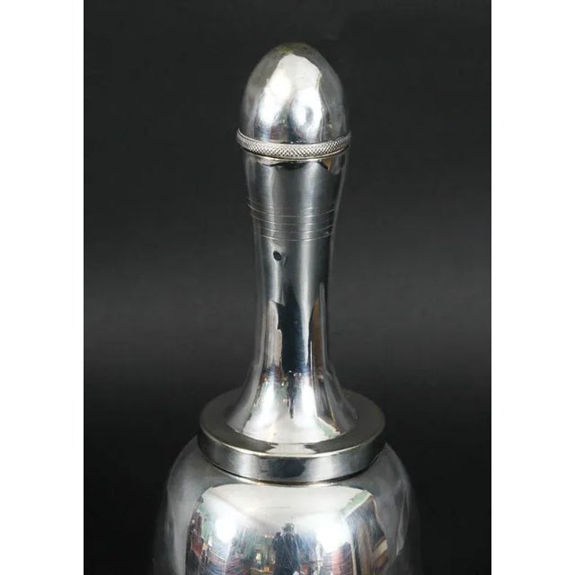 A superb antique Art Deco silver plate novelty cocktail shaker with the makers mark of the world renowned retailer Asprey...