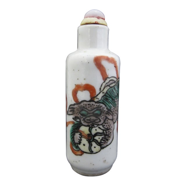 Chinese Porcelain Enameled Lion Foo Dog With Unraveling Ball Snuff Bottle For Sale