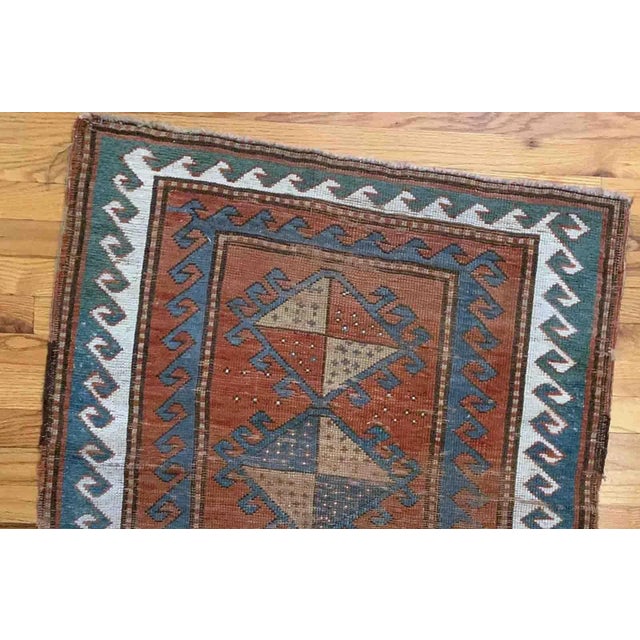 Handmade antique collectible Caucasian Kazak rug in natural dyes. The rug is from the end of 19th century in original...