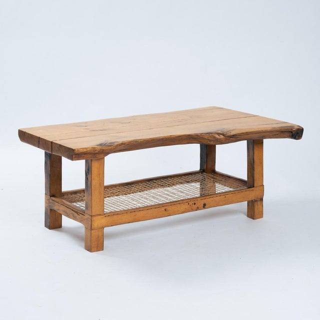 Crafted from solid oak, this vintage coffee table combines rustic character with timeless design. Standing 55 cm high, it...