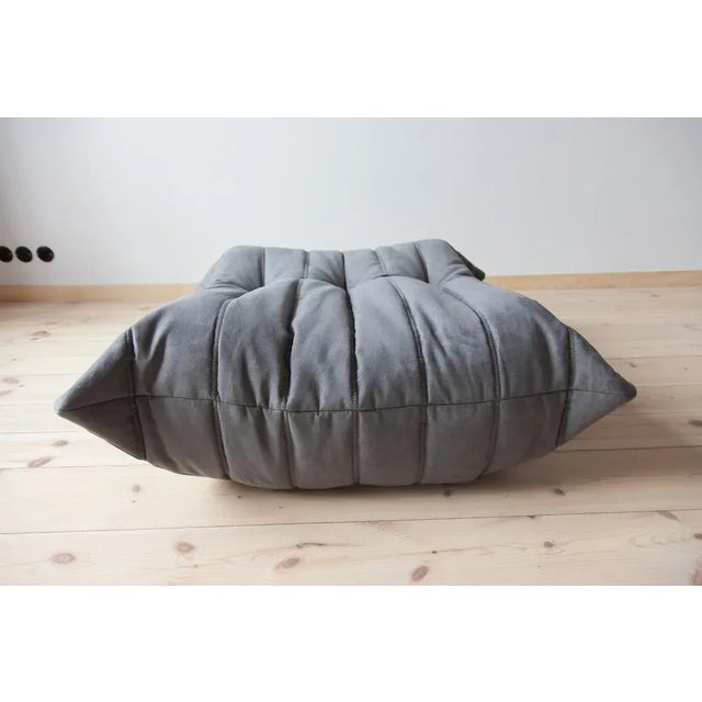 This Togo has been reupholstered with new foam and high-quality new fabric, keeping its inner structure giving the item...