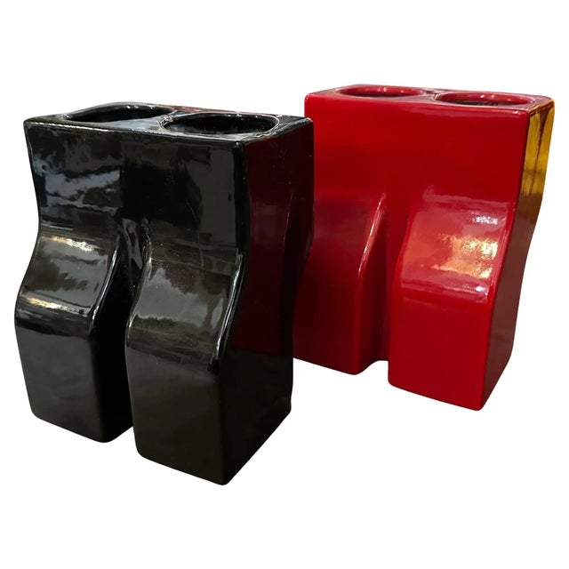 This striking pair of authentic 1970s Mid-Century Modern Italian ceramic vases was designed by Enzo Bioli for Il Picchio....