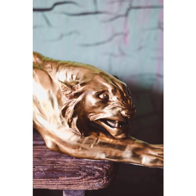 A majestic gold-painted porcelain statue. It is a unique piece, a master's proof from the renowned Cacciapuoti family, a...