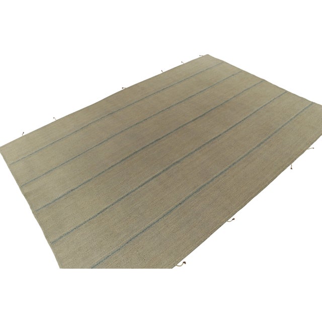 Handwoven in wool, a 10x15 contemporary kilim from an innovative new flat weave collection by Rug & Kilim. On the Design:...