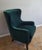 For sale is a beautiful high-back wing chair upholstered in a durable, easy-to-clean green velvet. A perfect accent piece...
