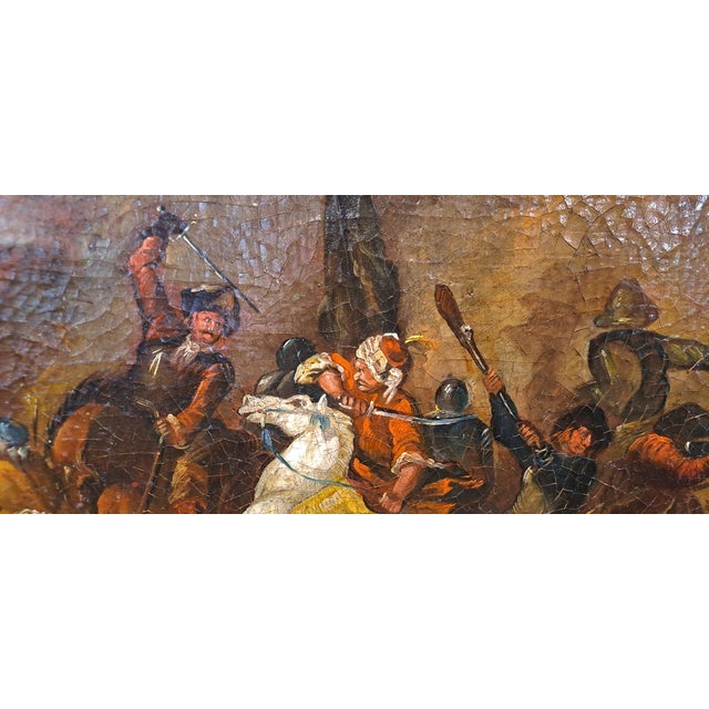 This oil on canvas painting depicts a heated battle scene and is attributed to a master of the Italian or Northern School,...