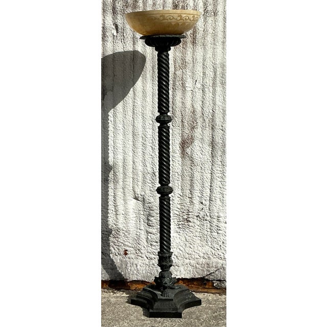 This vintage boho barley twist floor lamp showcases a beautifully patinated finish, adding character and warmth to any...