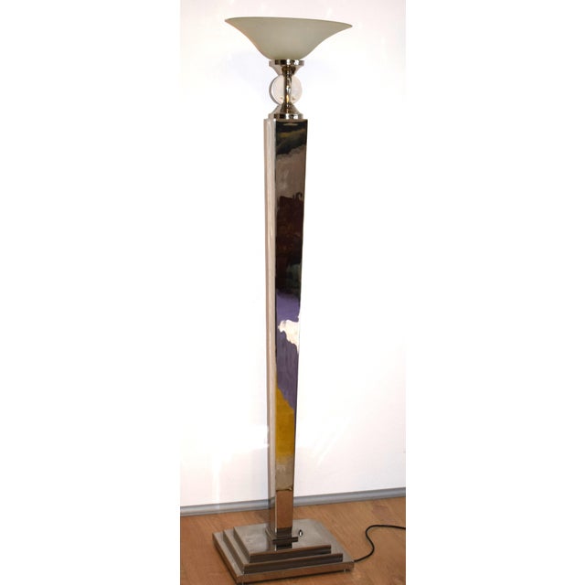 This floor lamp was designed by French designer Jean Claude Laville (Design Studio dessins) in collaboration with Austrian...
