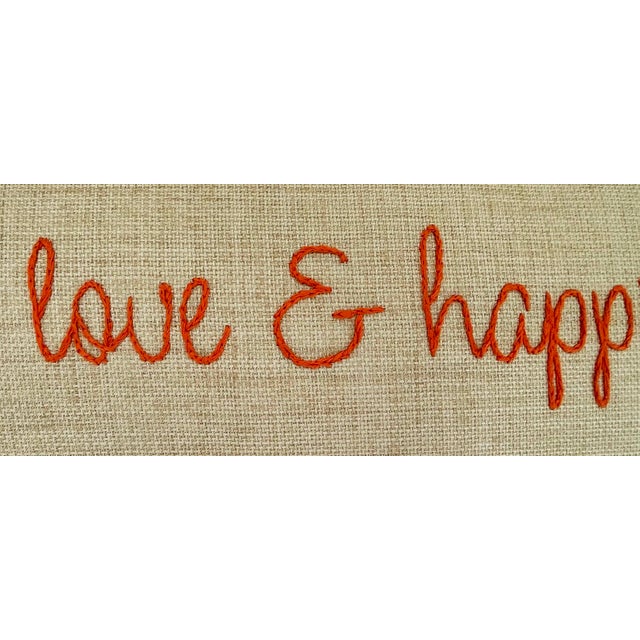 Custom made hand embroidered pillow. Woven linen front with sunny orange script "peace love & happiness" embroidery....