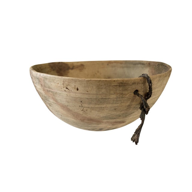 Handcrafted by the Hausa Niger nomads, these decorative wooden bowls are a one-of-a-kind piece of Saharan art. Durable...