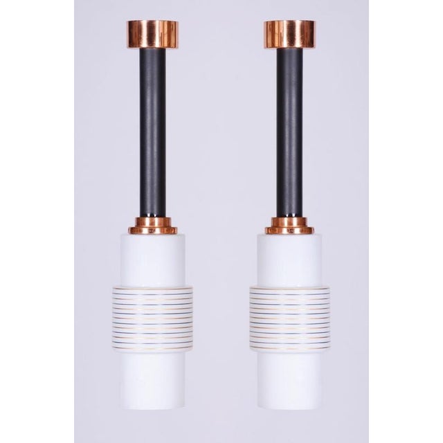 Maker: Drukov This sought-after pair of pendant lights from the 1950s, created in the workshops of the Czechoslovak...
