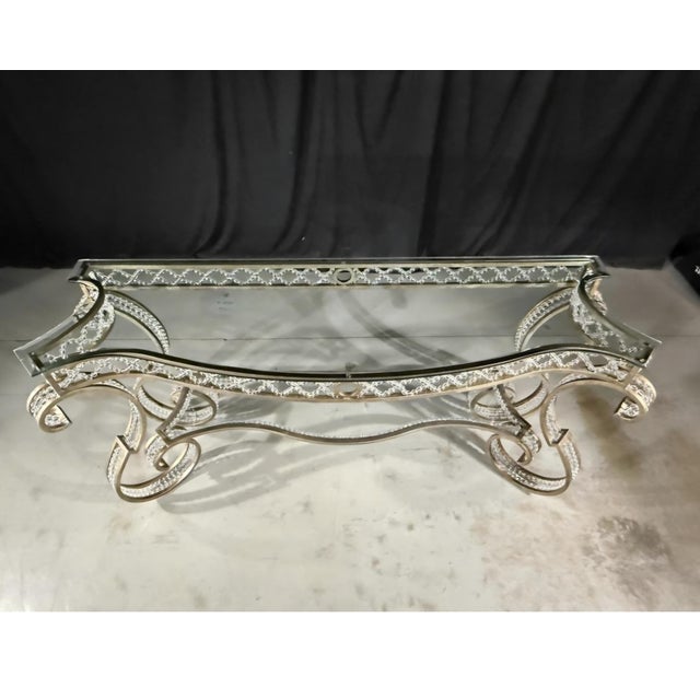 Combining timeless Old World charm with Hollywood Regency glamour, this statement piece features expertly crafted,...