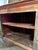 Make a bold statement with this antique hand-carved sideboard cabinet, beautifully finished in a distressed blush pink...