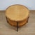 An Art Deco two tiered circular coffee table. Satin birch veneered with figured walnut banding. Dimensions: H 49cm D 68cm...