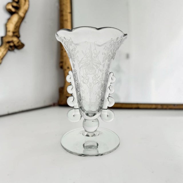 An authentic A. H. Heisey & Company footed cabinet vase in the Lariat pattern with Orchid etching, produced in Newark,...