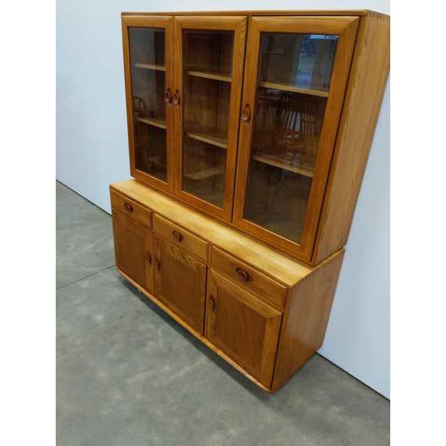 Authentic vintage sideboard / hutch / buffet / server / china / display cabinet. From the "Windsor" collection by Ercol....