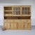 A substantial antique pine dresser offering an incredible amount of storage and display space. The upper section features...