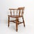 19th Century English Smoking Chair Elm armchair with curved back Dimensions: 66 x 61 cm, H: 79 cm, H: 44.5 cm Material:...