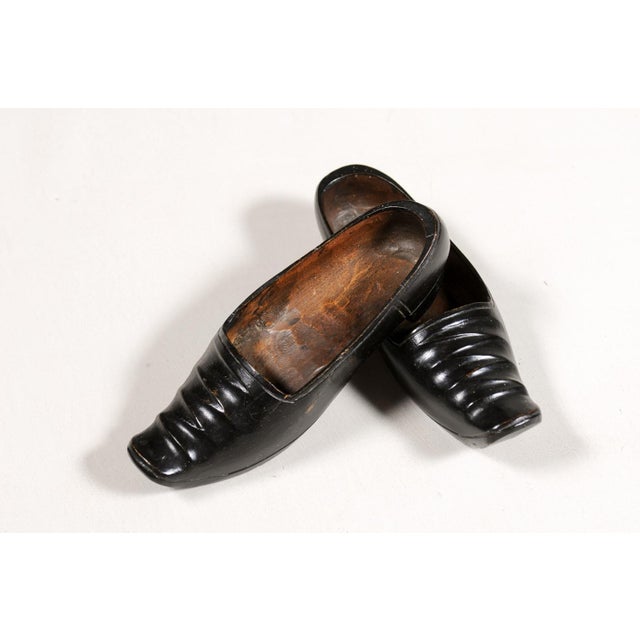19th Century Petite Dutch 19th Century Ladies' Carved Wooden Clogs with Black Paint - A Pair For Sale - Image 5 of 12