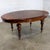 Marvelous 19th Century antique William IV style oval dining table composed of a mahogany frame with straight turned legs...