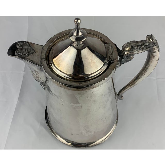 19th Century Silverplate coffee carafe with decorative handle and spout. From the Collection of Bob & Dolores Hope....