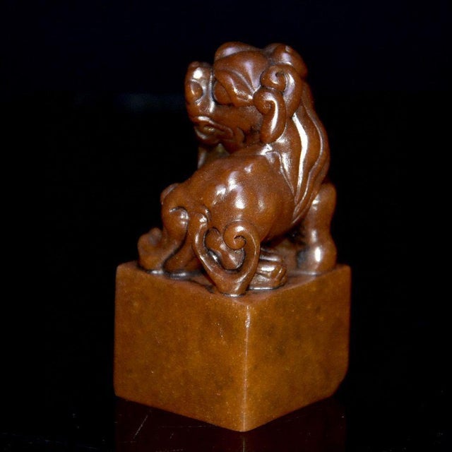 This beautifully crafted piece is a classic example of a traditional Chinese seal (chop). It features a square base topped...