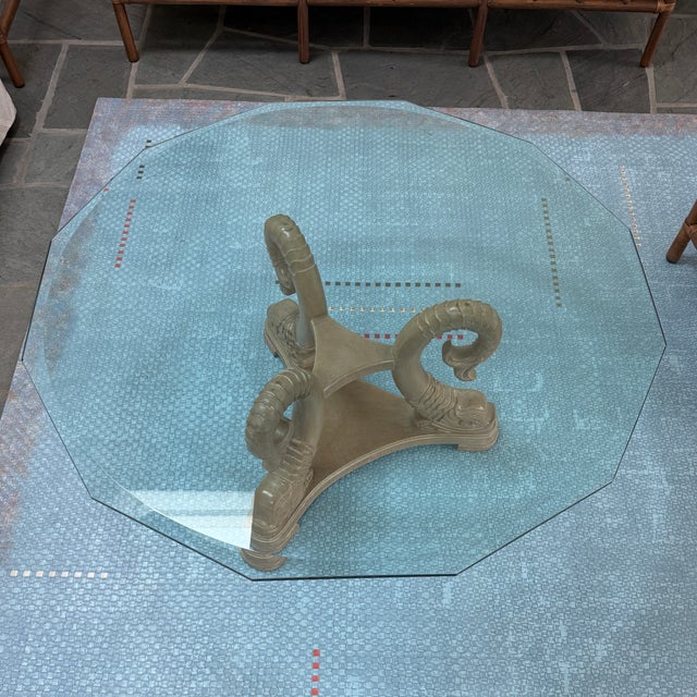 Vintage Dolphin Base Cocktail Coffee Table with Beveled Glass Top, c. 1970s. An elegant and eye catching piece with...