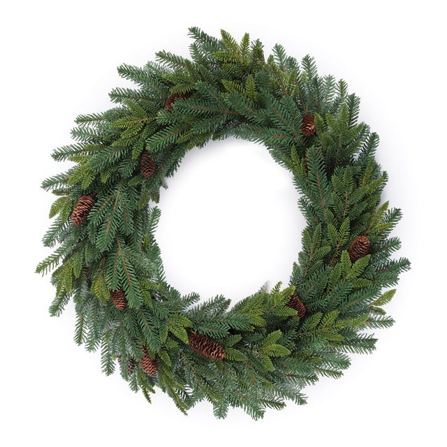 Make a grand holiday statement with this Large Pine and Pinecone Wreath. Measuring an impressive 34 inches in diameter,...