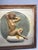 Studio craft relief carving of a nude woman in a seated, graceful pose. Hand carved with visible chisel marks and texture...