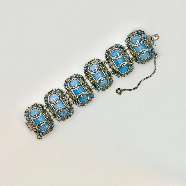 Vintage Home is pleased to present this stunning Antique Art Deco Clasp Cuff Bracelet. It features six octagonal elongated...