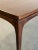 W66 D18 H14.75 Professionally refinished, this vintage coffee table has been restored to highlight the natural beauty of...