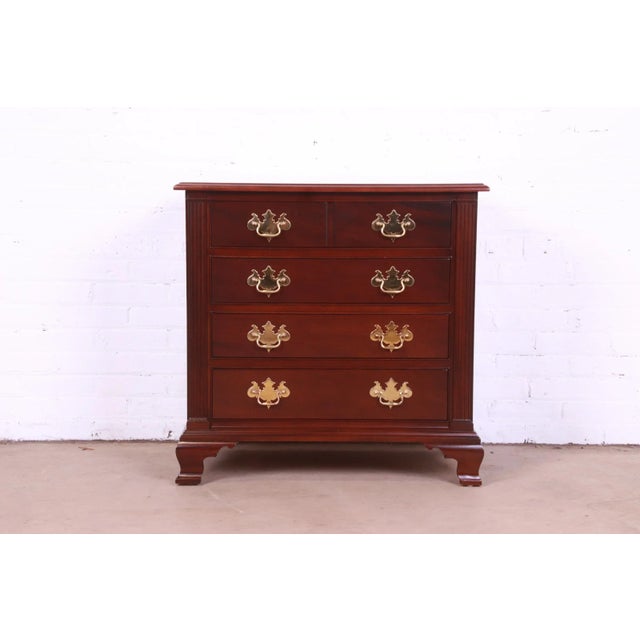 An exceptional Georgian or Chippendale style four-drawer dresser or chest of drawers By Stickley, "Colonial Williamsburg"...