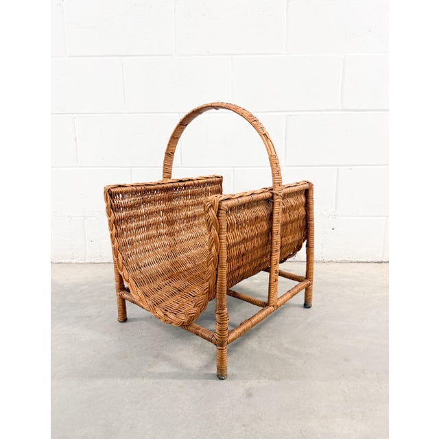 Charming vintage wicker footed basket featuring a braided edge and durable base. Ideal as a decorative accent for storing...