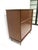 A very well-crafted Mid-Century walnut five drawer highboy dresser chest with unique built in pulls that follow the...