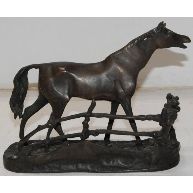The details make this cast metal horse a piece you need for your collection. The horse is backed by a rustic, rambling...