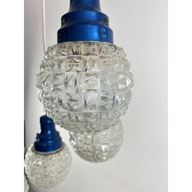 Mid-Century 5-light chandelier, Italian design from the 1960s Metal structure with glass bowls. E16 lamps. Intact and in...