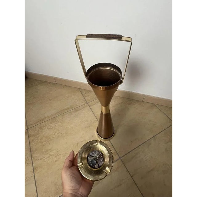 Column and copper column ashtray, Italy, 1950s Found in a notary study, it is intact and functioning. It has oxidations on...