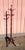 An antique Victorian Hunzinger style mahogany wooden hat and coat rack hall tree dating back to the 1900s. The turned...