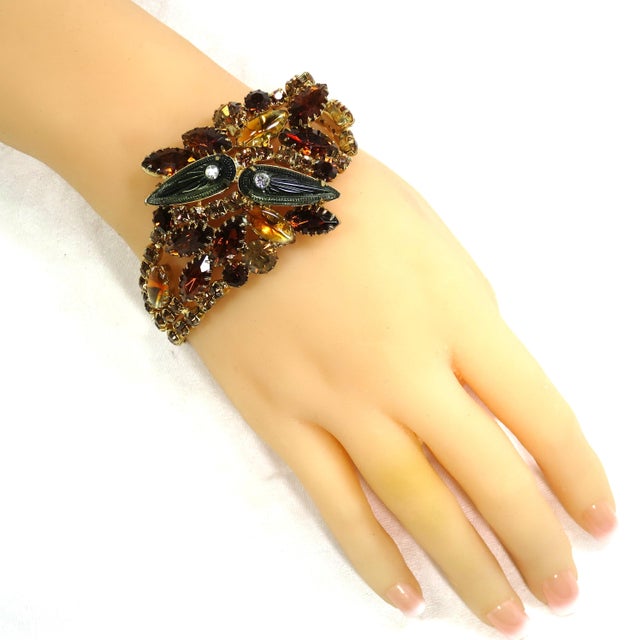 Vintage 1950s gold-plated crystal and art glass bracelet. Domed centerpiece w/ citrine and amber crystals surrounding...