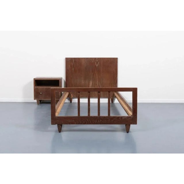 Single bed frame with nightstand in stained wood finish from Paolo Buffa, Italy 1950’s. Condition Fair, age related wear...