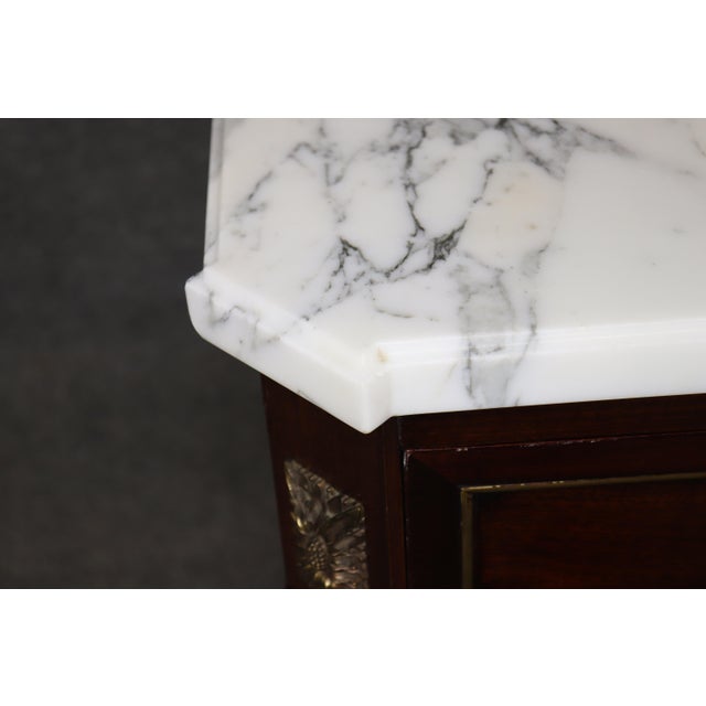 Dimensions: 32.75 inches high x 50.5inches wide x 20.25 inches deep. A refined and classically proportioned French Louis...