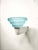 Light Blue Glass Wall Lamp from Leucos, 1980s, in Very Good conditions. Designed 1980 to 1989 This piece has an...