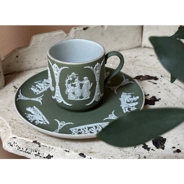 Elegant early to mid 20th century Wedgwood demitasse cup and saucer in a classic celadon (sage) green with white...