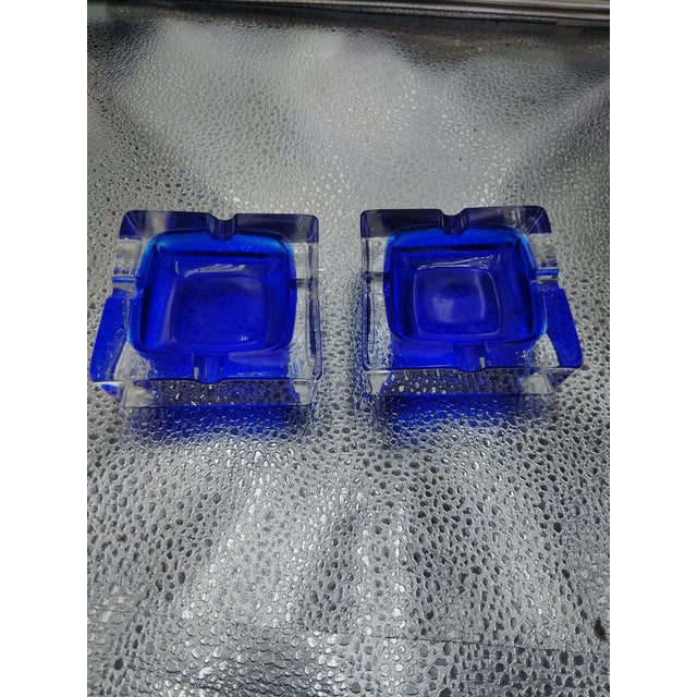 JG Durand is a crystal ashtray, from France, cobalt blue color and clear, made with durability material.