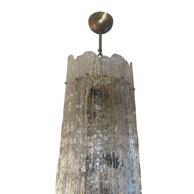 Striking 1960's Italian Murano glass pendant light featuring a cylindrical form composed of elongated textured glass...