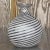 A fabulous vintage Boho Art glass vase. A chic swirl design in graphic black and white. Signed and numbered on the bottom....