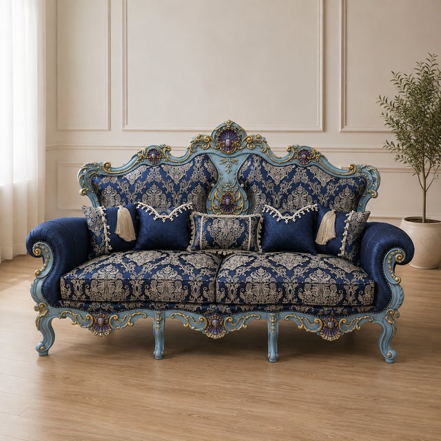 Bring an unmistakable sense of French aristocratic elegance to your interior with this grand three-seater sofa. The piece...